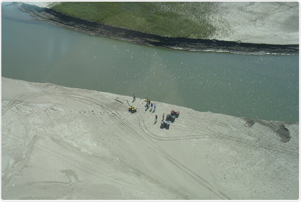 Aerial photo of a field deeply eroded by flooding