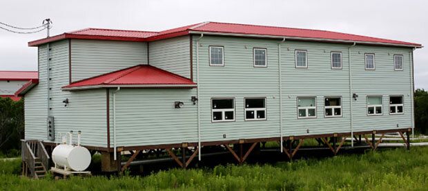 Photo of a house being elevated